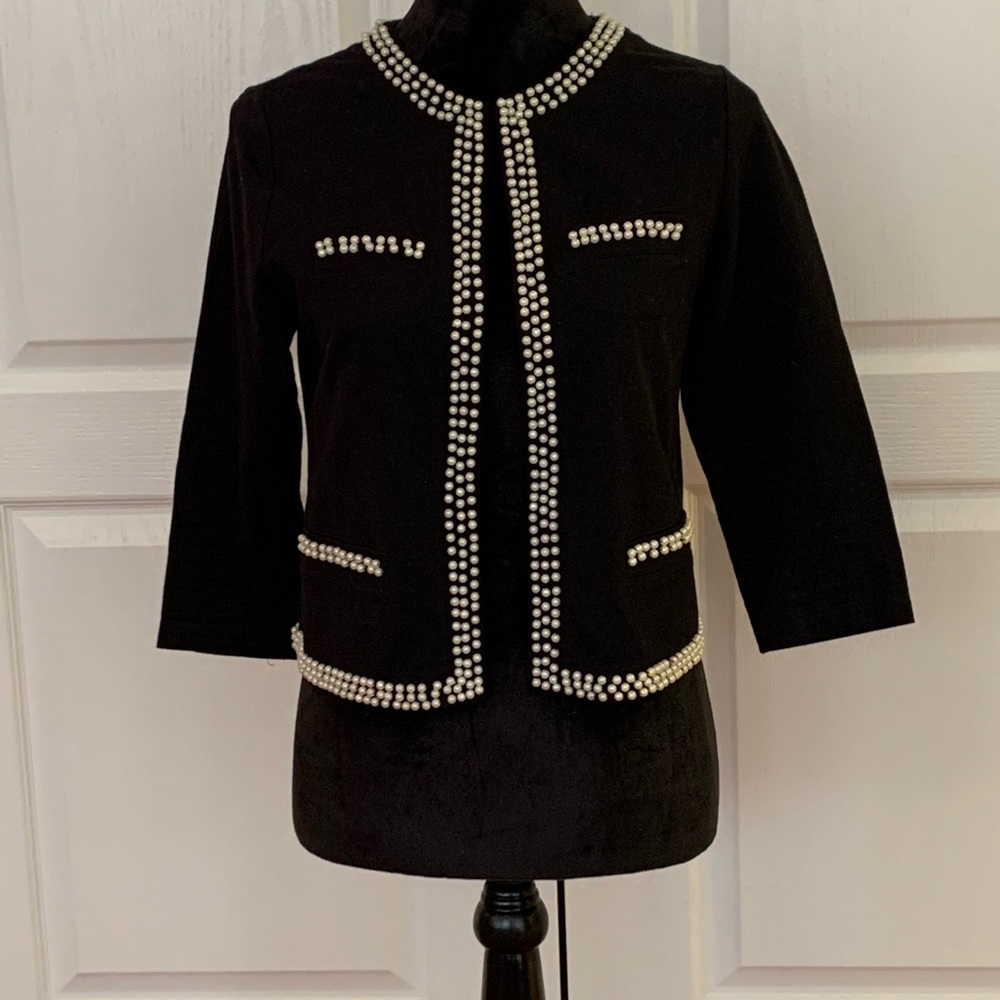 Forever XXI black sweater with white pearl trim. Item in good condition.